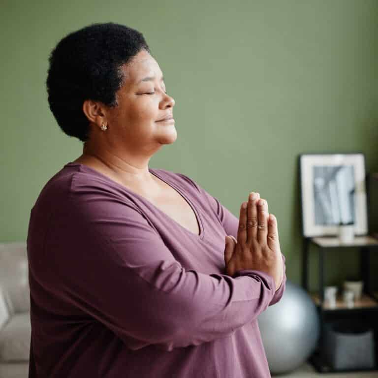 Woman at home alone, at peace