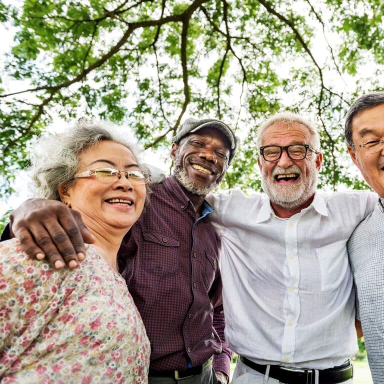 Group of smiling friends in a park
